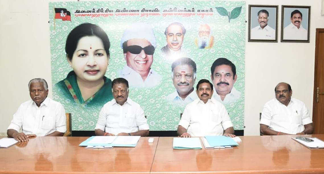 AIADMK leaders O Panneerselvam (second from left) and E Palaniswami (third from left) at a part meeting. (Twitter/AIADMKOfficial)