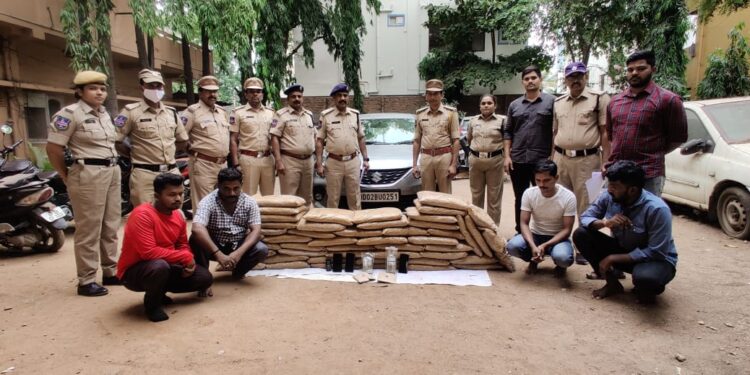 Cyberabad Metropolitan Police present the four suspects along with the seized 125 kg marijuana. (Supplied)