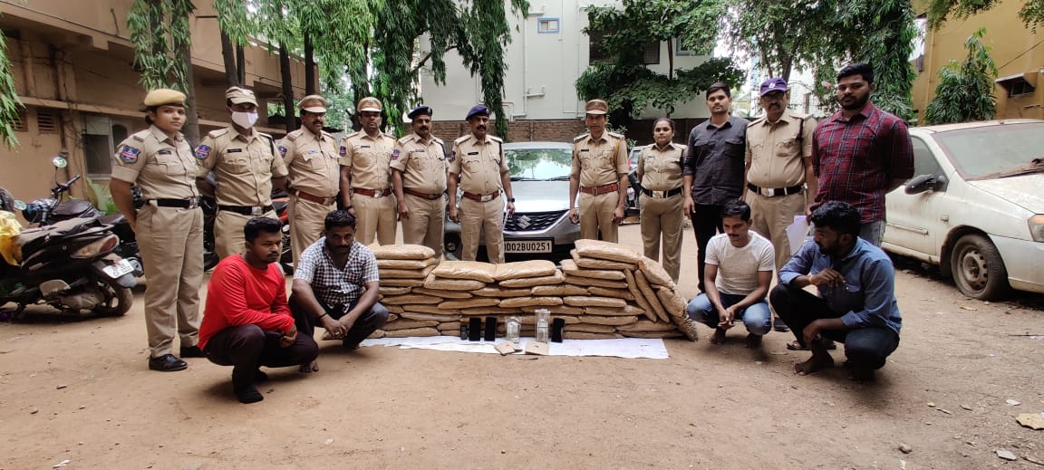 Cyberabad Metropolitan Police present the four suspects along with the seized 125 kg marijuana. (Supplied)