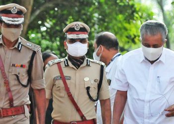 Chief Minister Pinarayi Vijayan being escorted by police officials in Thiruvananthapuram. (South First)