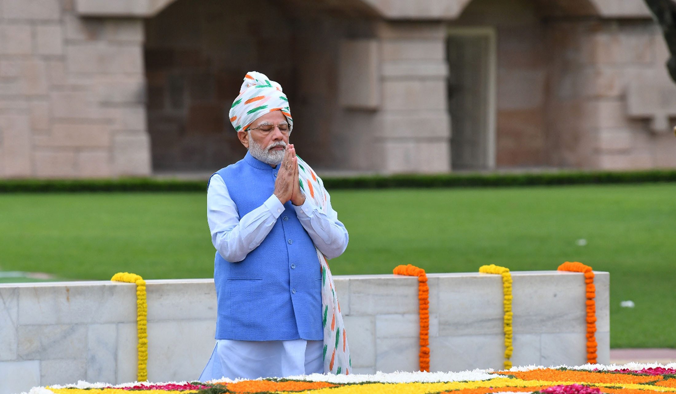 Prime Minister Narendra Modi paying homage at Mahatma Gandhi memorial at New Delhi ahead of his 76th Independence Day speech. Source: PIB