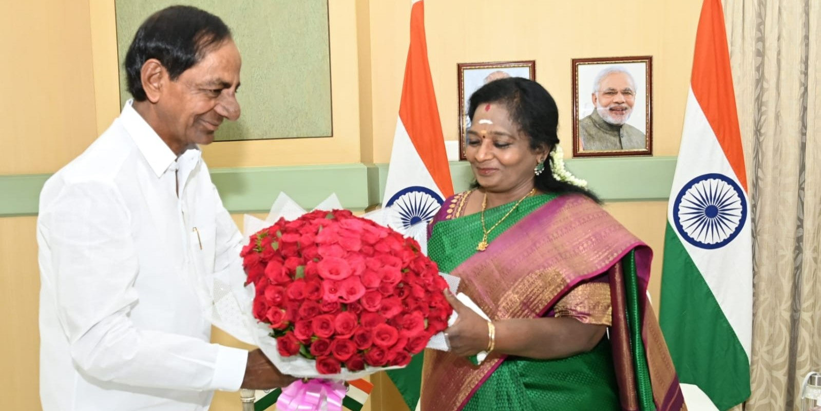 A file picture of Telangana Chief Minister K Chandrashekar Rao greets Governor Tamilisai Soundararajan at the oath-taking ceremony of Justice Sri Ujjal Bhuyan as Chief Justice of the High Court of Telangana (Official Facebook: KalvakuntlaChandrashekarRao)