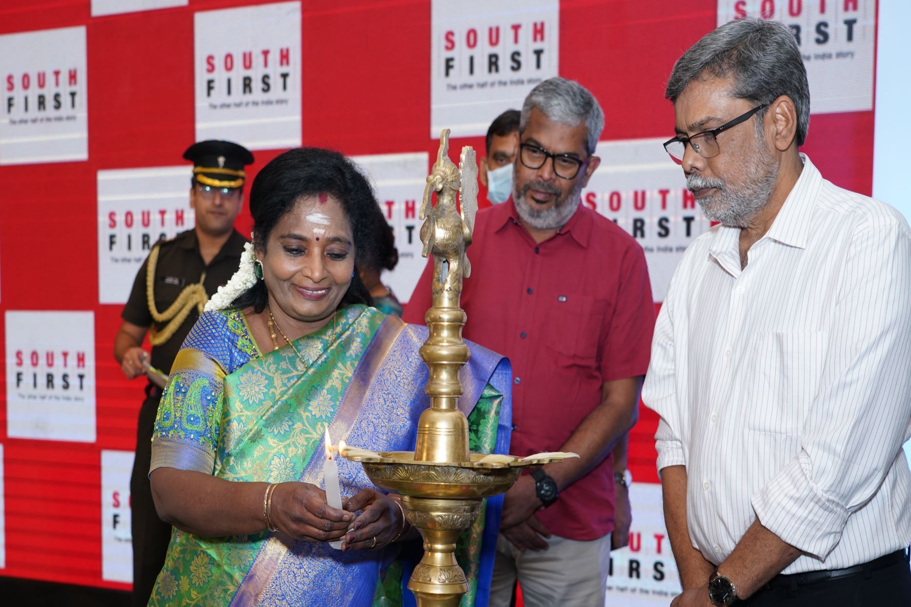 Telangana Governor Dr Tamilisai Soundararajan lighting the lamp at the launch of South First news portal on Saturday, 17 September in Hyderabad. (South First)