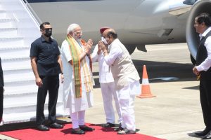 Karnataka Chief Minister Basavaraj Bommai receives Prime Minister Narendra Modi at Mangaluru on Friday, 2 September 2022. (Supplied)