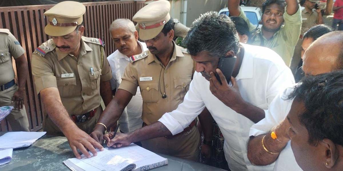 Coimbatore police taking BJP leaders into custody at Peelamedu police station on Wednesday, 21 September. (South First)