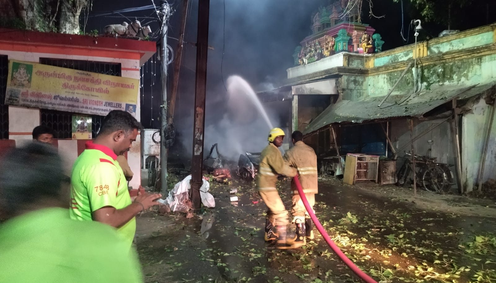 Firefighters at the scene of the Coimbatore blast. (Supplied)