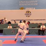 Karthik (on left) in action at the CKC in Birmingham. (Supplied)