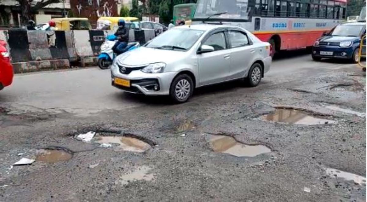 Potholes on Vatal Nagaraj Road near Lulu Mall