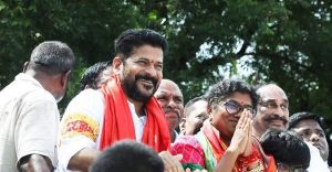 Telangana Pradesh Congress Committee (TPCC) president A Revanth Reddy with the Congress' Munugode by-election candidate Palvai Sravanthi on Friday, 14 October, 2022. (Supplied)