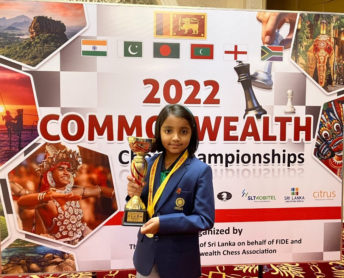 Charvi Anilkumar with the trophy of the 2022 Commonwealth Youth Chess Championships held in Sri Lanka.