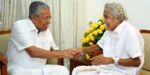 Kerala Chief Minister Pinarayi Vijayan (left) with his predecessor Oommen Chandy. (pinarayivijayan/Twitter)
