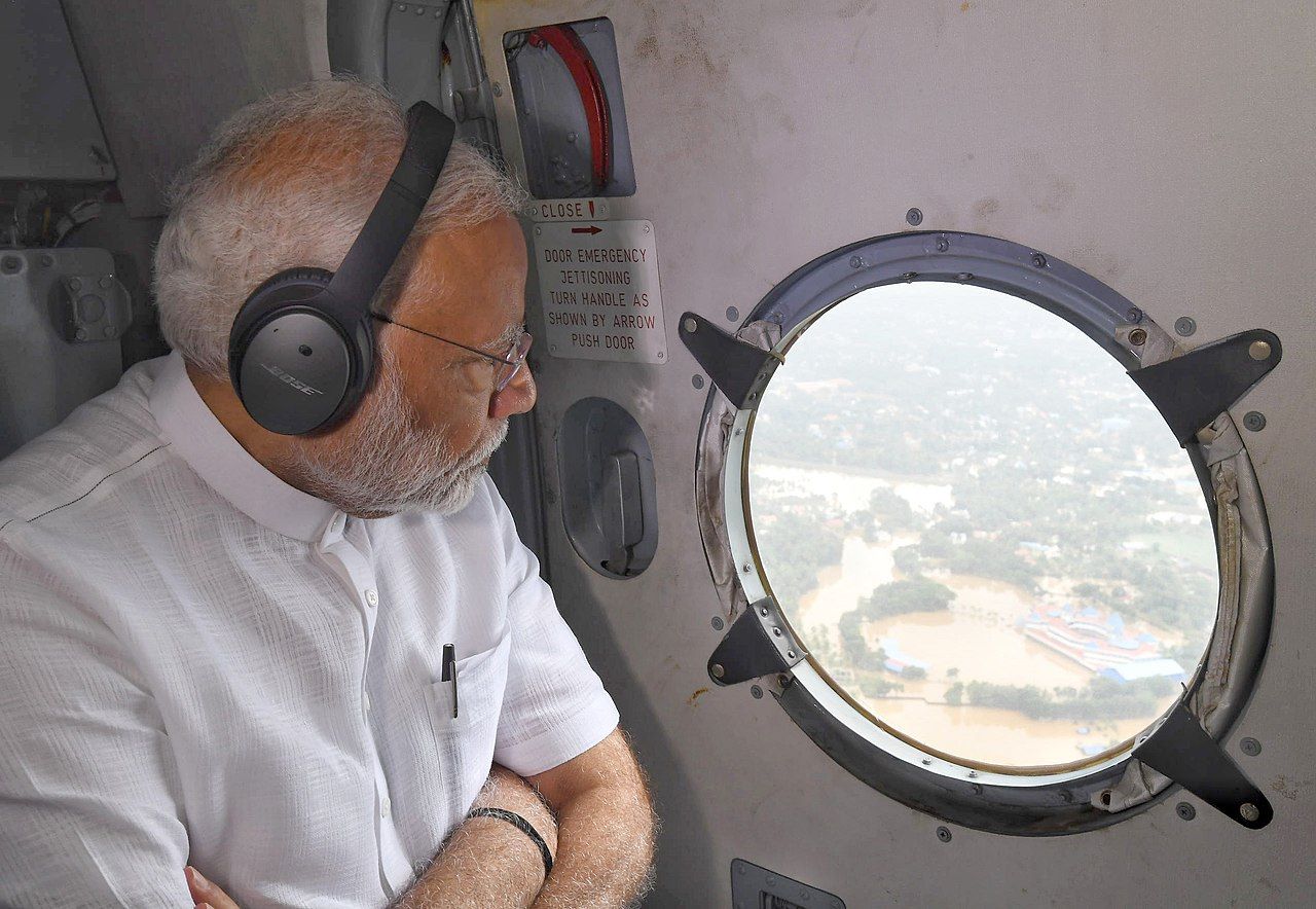 Prime Minister Narendra Modi conducting an aerial survey of the flood-affected areas in Kerala on 18 August 2018. (Wikimedia Commons)