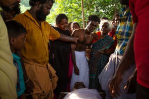 Family and friends of Ranganathan with his body 