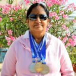 Seetha Khambhampati with her swimming medals in 2019.
