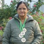 Seetha Khambhampati with her swimming medals in 2022.