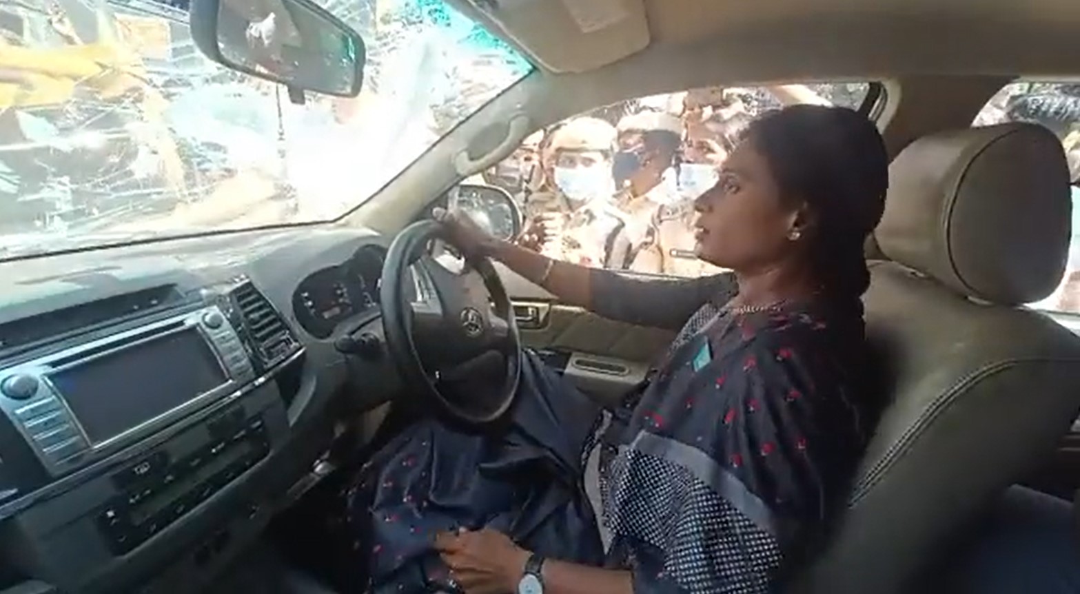 YS Sharmila in her car as it was towed on Tuesday, 29 November, 2022. (Screengrab)