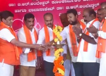 Rowdy Silent Sunil on the dais with MP PC Mohan and BJP leader NR Ramesh on Sunday, 27 November, 2022, in Chamarajapet in Bengaluru. (Supplied)