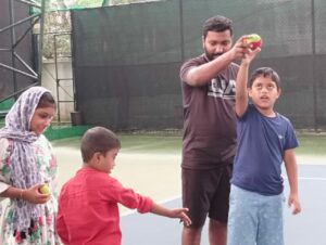 Children undergoing tennis lessons at Trivandrum Tennis Club on 14 November (Supplied).