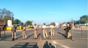 Cops block traffic on the road near Dargha in Hubballi