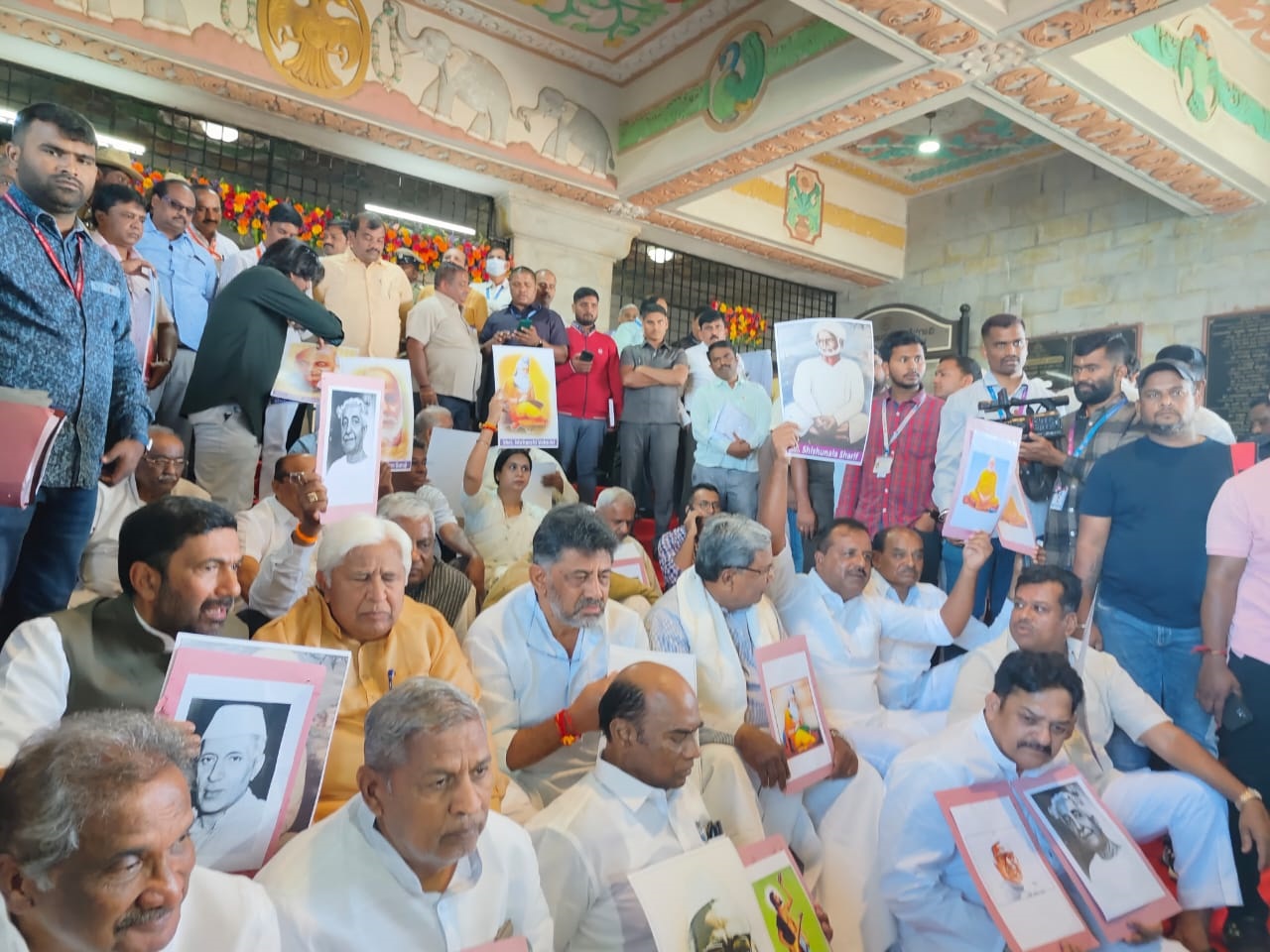 Congress MLAs protest against the unveiling of Savarkar's portrait in Belagavi on Monday, 19 December. (Supplied)