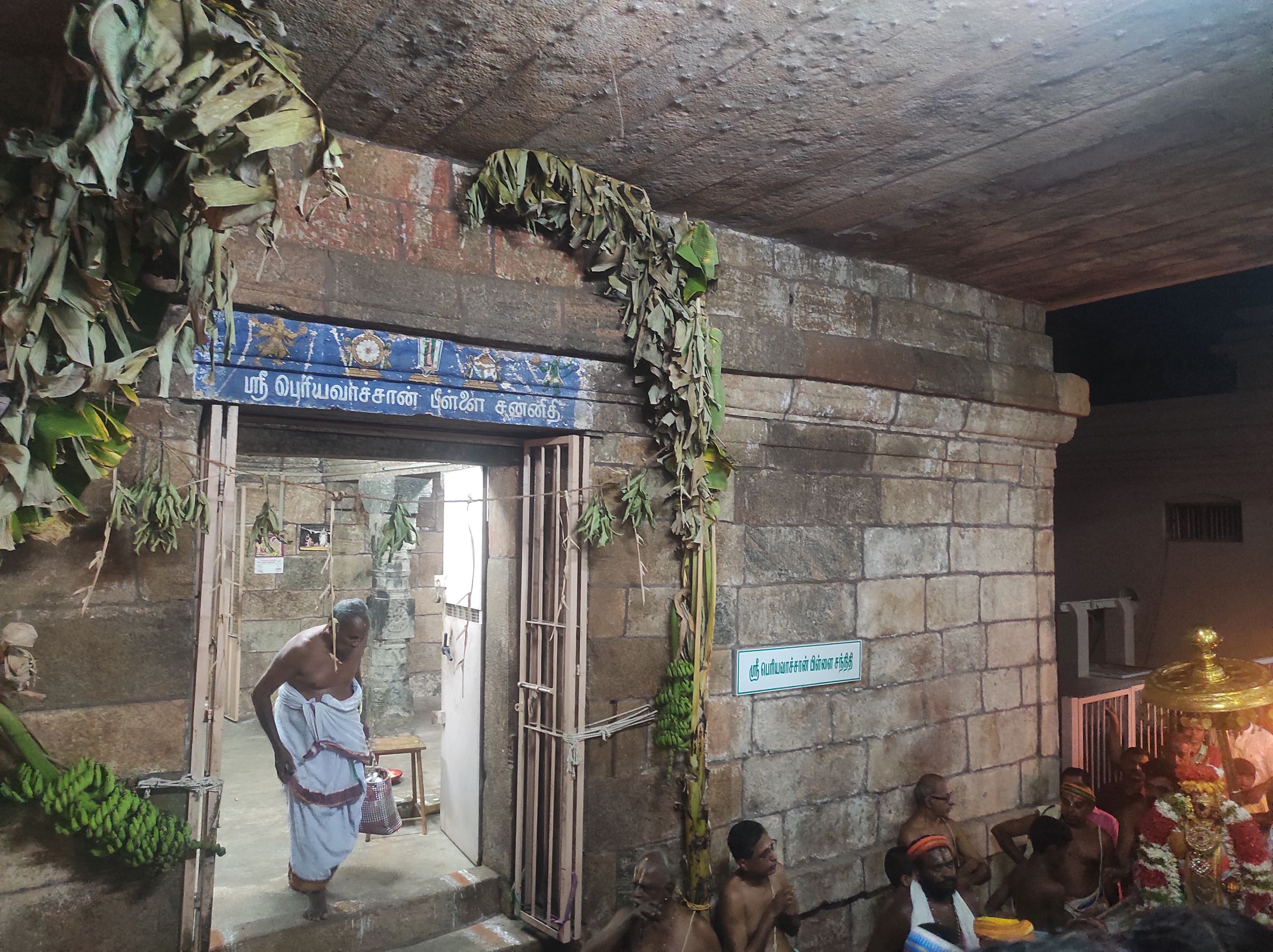 Namperumal, the Srirangam utsavar, visits the shrine of 'Vyakhyana Chakravarti' Periyavachan Pillai inside the temple during Vasanthotsavam. Periyavachan Pillai is a disciple of Nampillai, who has himself a commentary on Nammazhwar's Thiruvaimozhi