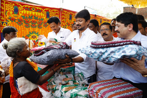 Udhayanidhi and other DMK members handed out relief materials after Cyclone Mandous hit the city. (Udhay/Twitter)