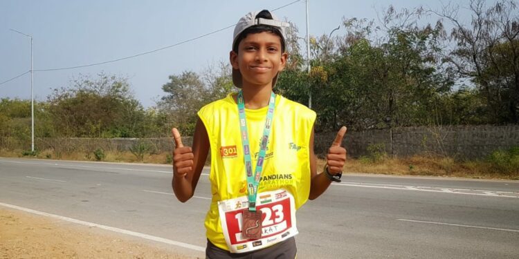 Venkat Reddy Hyderabad marathon ironman runner after winning a medal.