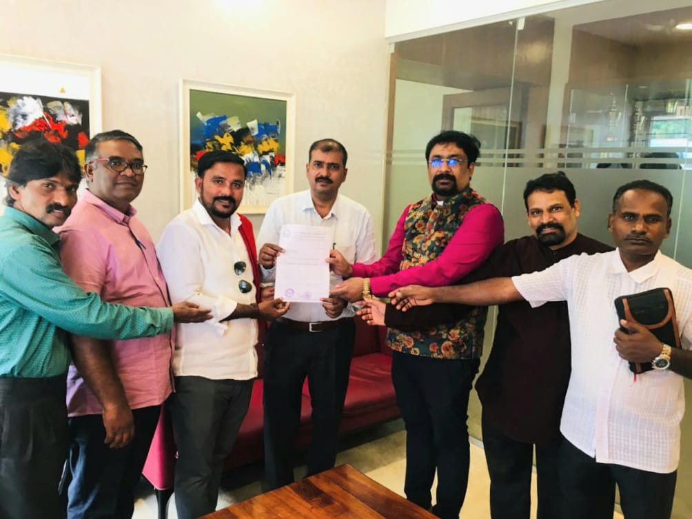Akhila Bharatha Christha Mahasabha members handing over the memorandum to Public Relations Officer (PRO) at DG's Headquarters in Bengaluru