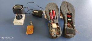 Anti-rape footwear and the keychain with radiofrequency transmitter and receiver. (Supplied)
