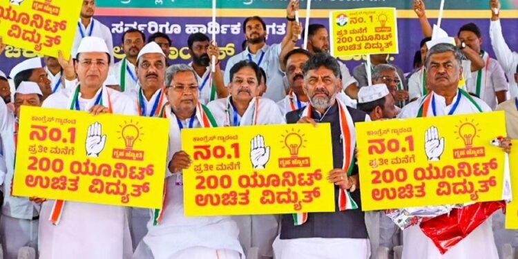 Congress announces Gruhajoyti Bhagya - free electricity of 200 units to every house, if voted to power, in Belagavi on Wednesday. (Pic - Twitter D K Shivakumar)