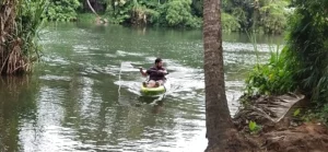 A tourist kayaking at Maravanthuruthu village in Kottayam district in Kerala. (Supplied)