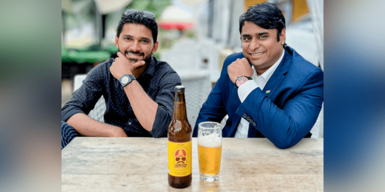 Chandramohan Nallur and Sargheve Sukumaran with their product, Malayali Beer. (Supplied)