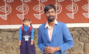 Akshay Mashelkar with 'Shiksha', the Karnataka education robot
