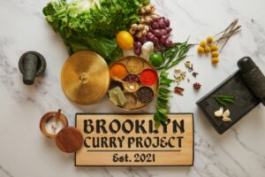 The couple's initiative t make friends led to the founding of Brooklyn Curry Project. (Supplied)