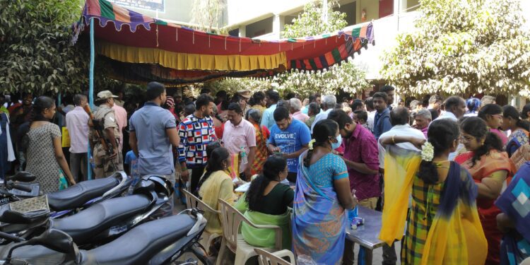 Voters stand in the queue for the Erode East bypolls in Tamil Nadu on Monday, 27 February, 2023. (Supplied)