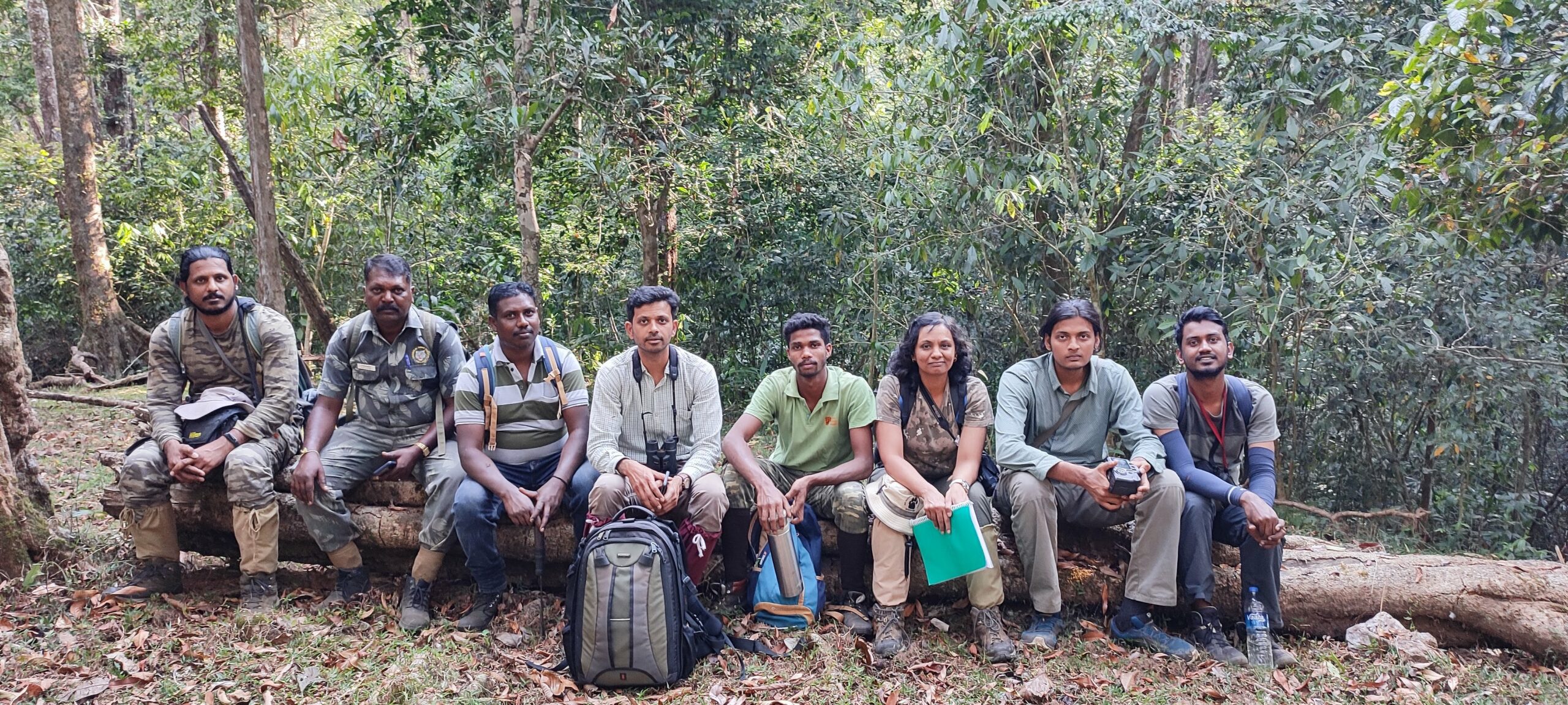 Among those behind protected species on Anamalai Hills, Left to right: Srinivasan Kasinathan (restoration ecologist), forest department staff Selvakumar, Moorthi G, Navendu Page, Rajesh R, Kshama Bhat, AP Madhavan, Akhil Murali. (Nature Conservation Foundation)