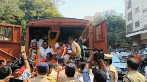 The police taking BJP Kisan Morcha activists into protective custody near the state Assembly. (Supplied)