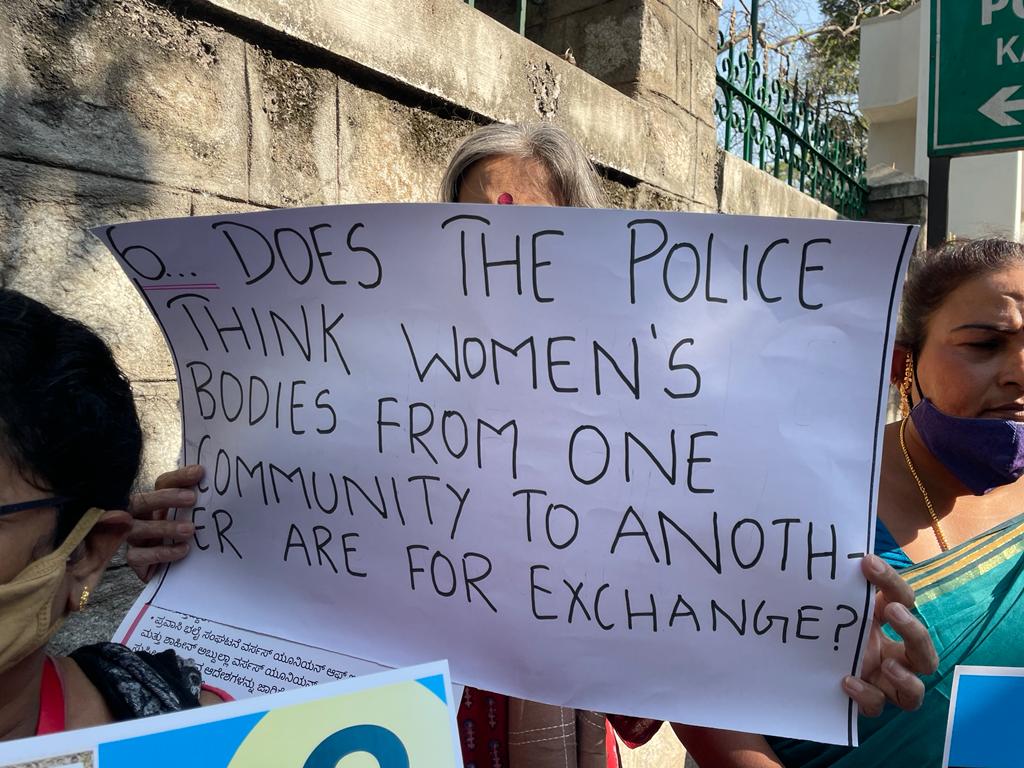 A placard by civil society groups before police head quarters in Bengaluru on Tuesday
