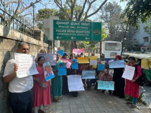 Civil society groups against hate speech before police head quarters in Bengaluru on Tuesday