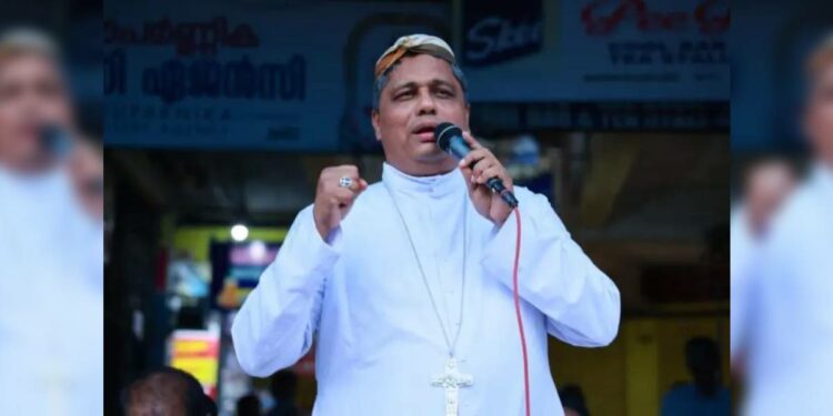 Mar Joseph Pamplany, the Archbishop of Thalassery, wearing the traditional farmers' cap. (Supplied).