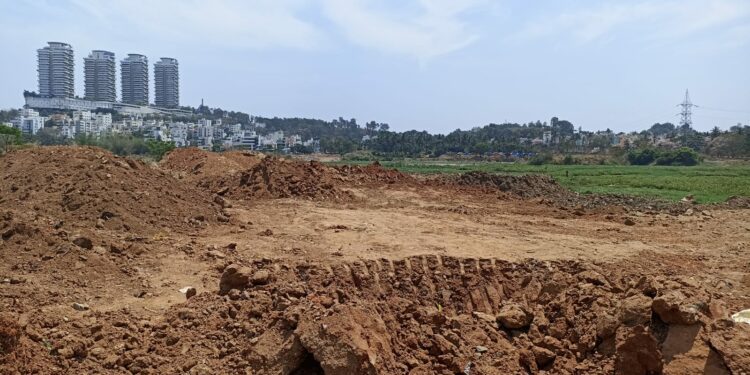 Hoskerehalli lake dumped with debris for muddy road
