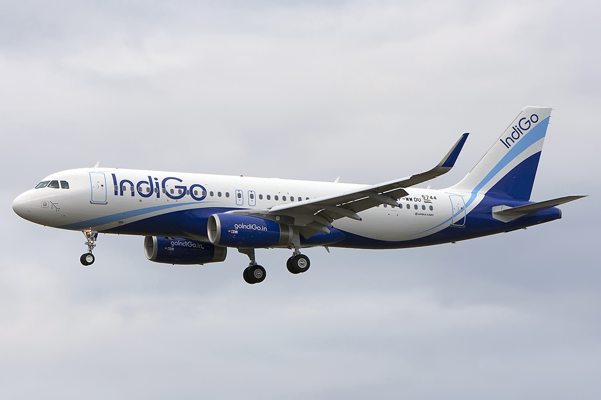 Delhi-Bengaluru Indigo flight Drunk passenger booked for trying to open emergency exit flap midair