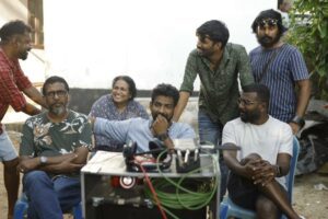 Director Muhasin, Harshad and Sreeja Ravi on the sets of the movie Kadina Kadoramee Andakadaham