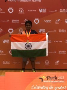 Varun after winning his first medal at World Transplant Games held in Australia