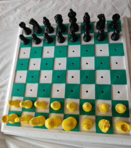 A chess board for visually impaired players at Devanoor school open chess tournament for blind