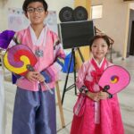 Children wearing Hnbok at first Korean Film Festival in Hyderabad
