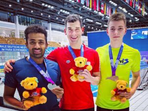 Niranjan Mukundan (left) after the medal ceremony at the Berlin Para-swimming World Series. 