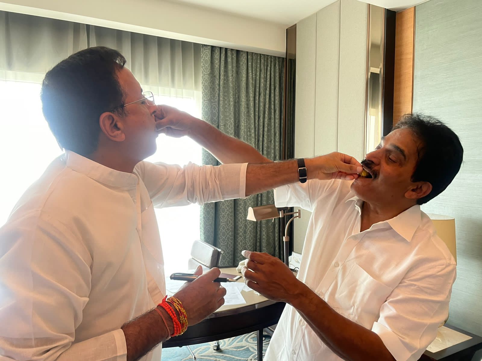 Congress leaders Randeep Singh Sujrewala and KC Venugopal celebrating party's victory in K'taka elections