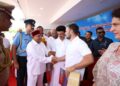 Governor of Karnataka Gehlot shakes Rahul Gandhi's hand while Tamil Nadu Chief Minister MK Stalin overlooks. (Supplied)