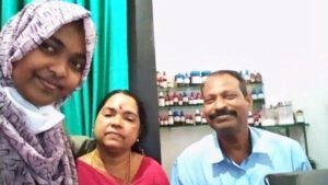 Hadiya with parents at her clinic